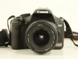 Canon EOS 450D digitale spiegelreflexcamera met lens, batterij oplader en kipling camera tas – foto 4 – kavel bij De Kringwinkel, Antwerpen