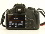 Canon EOS 450D digitale spiegelreflexcamera met lens, batterij oplader en kipling camera tas – foto 7 – kavel bij De Kringwinkel, Antwerpen