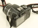Canon EOS 450D digitale spiegelreflexcamera met lens, batterij oplader en kipling camera tas – foto 8 – kavel bij De Kringwinkel, Antwerpen