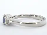 Witgouden trilogy ring met diamanten en saffier – foto 7 – kavel bij Onlineveilingmeester