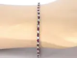 Witgouden tennisarmband met diamanten en robijnen – foto 2 – kavel bij Onlineveilingmeester