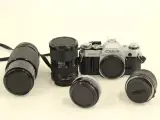 Canon AE-1 spiegelreflexcamera met lenzen en toebehoren – foto 2 – kavel bij De Kringwinkel, Antwerpen