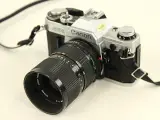 Canon AE-1 spiegelreflexcamera met lenzen en toebehoren – foto 15 – kavel bij De Kringwinkel, Antwerpen
