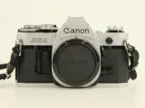 Canon AE-1 spiegelreflexcamera met lenzen en toebehoren – foto 3 – kavel bij De Kringwinkel, Antwerpen