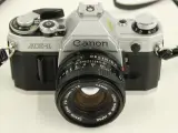 Canon AE-1 spiegelreflexcamera met lenzen en toebehoren – foto 9 – kavel bij De Kringwinkel, Antwerpen