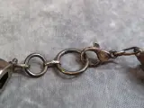 Zilveren hanger en armband met turquoise stenen – foto 11 – kavel bij De Kringwinkel, Gent