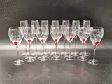 Set van 14 wijn- en champagneglazen met rode accenten in de stoom – kavel bij De Kringwinkel, Gent