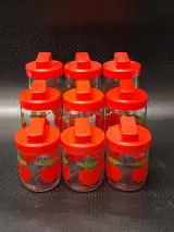 Set van 9 vintage Gulf appel voorraadpotten geproduceerd door Verreries Mécaniques Champenoises France (VMC) – kavel bij De Kringwinkel, Gent