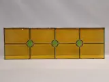 Geometrisch glas-in-lood paneel met groene rondellen en warm geel kathedraalglas – kavel bij De Kringwinkel, Gent