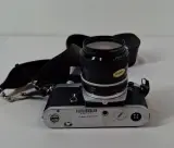 Nikon FM analoge spiegelreflexcamera met lens en draagriem – foto 5 – kavel bij De Kringwinkel, Geraardsbergen