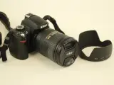 Nikon digitale D60 spiegelreflexcamera met lens, lader en draagtas – foto 3 – kavel bij De Kringwinkel, Antwerpen