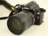 Nikon digitale D60 spiegelreflexcamera met lens, lader en draagtas – foto 5 – kavel bij De Kringwinkel, Antwerpen