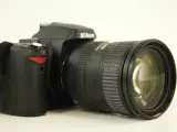 Nikon digitale D60 spiegelreflexcamera met lens, lader en draagtas – foto 7 – kavel bij De Kringwinkel, Antwerpen