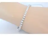 Witgouden tennisarmband met 7.50 carat briljant geslepen diamanten – foto 2 – kavel bij Onlineveilingmeester