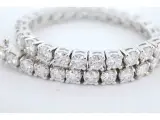 Witgouden tennisarmband met 7.50 carat briljant geslepen diamanten – foto 4 – kavel bij Onlineveilingmeester