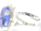 Witgouden entourage ring met een tanzaniet van 7.00 carat – foto 7 – kavel bij Onlineveilingmeester