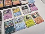 Bijzondere Pokémonverzameling – vintage kaarten – Gengar – Charmander – Rhydon – verzamelmap – ongeopend Lycanroc GX-pakket – foto 2 – kavel bij Onlineveilingmeester, Groningen
