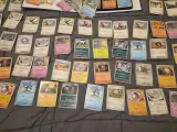 Grote Pokémonkaartenverzameling met zeldzame kaarten, verzamelmap en Pokémon-blik – foto 3 – kavel bij Onlineveilingmeester, Groningen