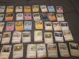 Grote Pokémonkaartenverzameling met zeldzame kaarten, verzamelmap en Pokémon-blik – foto 8 – kavel bij Onlineveilingmeester, Groningen