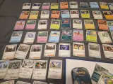 Grote Pokémonkaartenverzameling met zeldzame kaarten, verzamelmap en Pokémon-blik – foto 10 – kavel bij Onlineveilingmeester, Groningen