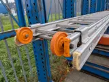 2-delige uitschuifbare ladder met gevelrol, 2x16-treeds – foto 3 – kavel bij Onlineveilingmeester, Heerenveen