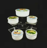Set Villeroy & Boch, Design Naif, 4+1 porseleinen dozen van Gérard Laplau – foto 2 – kavel bij De Kringwinkel, Turnhout