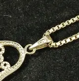 Set van twee zilveren kettingen met hangers – foto 6 – kavel bij De Kringwinkel, Turnhout