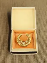 18 karaat gouden florale kransbroche – foto 2 – kavel bij De Kringwinkel, Antwerpen