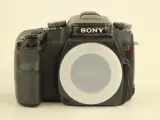 Sony Alpha 100 digitale spiegelreflexcamera met zoomlens en accessoires – foto 3 – kavel bij De Kringwinkel, Antwerpen