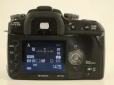 Sony Alpha 100 digitale spiegelreflexcamera met zoomlens en accessoires – foto 6 – kavel bij De Kringwinkel, Antwerpen
