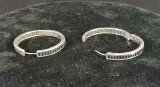 Set zilveren oorbellen met blauwe steentjes en ring met paarse steentjes – foto 4 – kavel bij De Kringwinkel, Turnhout