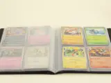 Pokémon kaarten in een verzamelalbum en metalen tins – foto 3 – kavel bij De Kringwinkel, Antwerpen