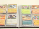 Pokémon kaarten in een verzamelalbum en metalen tins – foto 4 – kavel bij De Kringwinkel, Antwerpen