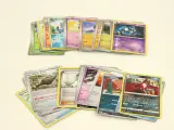 Pokémon kaarten in een verzamelalbum en metalen tins – foto 7 – kavel bij De Kringwinkel, Antwerpen