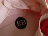 Rode Coca-Cola sporttas met witte accenten – foto 5 – kavel bij De Kringwinkel, Heverlee