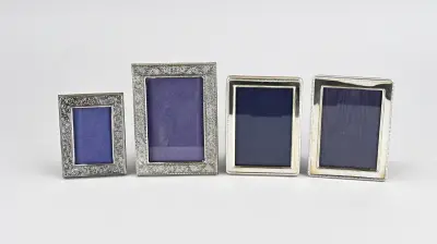 4 Zilveren fotolijsten – kavel bij Twents Veilinghuis