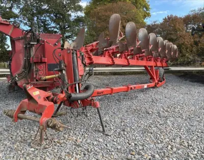 Huard SP875T Halfgedragen wentelploeg – kavel bij Dome Auctions, Ronquières