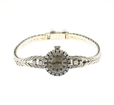 Witgouden horloge met diamant – kavel bij Twents Veilinghuis