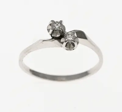 Witgouden slagring met diamant – kavel bij Twents Veilinghuis