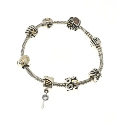 Pandora armband met bedels van goud – kavel bij Twents Veilinghuis