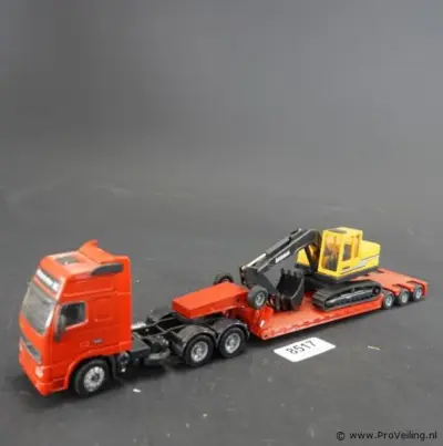 Joal Volvo FH16 vrachtwagen met een dieplader en een Joal Åkerman dieplepelgraafmachine – kavel bij ProVeiling, Wageningen