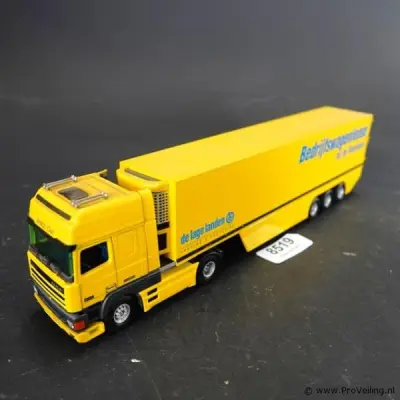 Tekno DAF 95-vrachtwagen met een oplegger in de kleuren van Bedrijfswagenlease bij de Rabobank en de Lage Landen – kavel bij ProVeiling, Wageningen