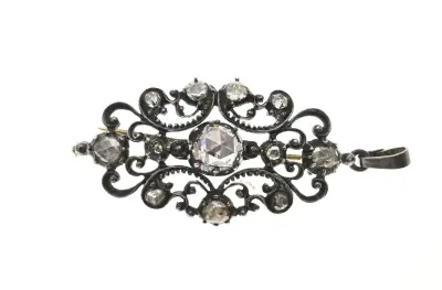 Broche met zilver goud diamant – kavel bij Twents Veilinghuis
