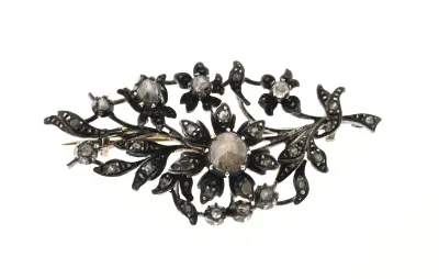 Broche met zilver goud diamant – kavel bij Twents Veilinghuis