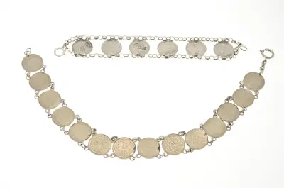 Zilveren collier en armband met munten – kavel bij Twents Veilinghuis