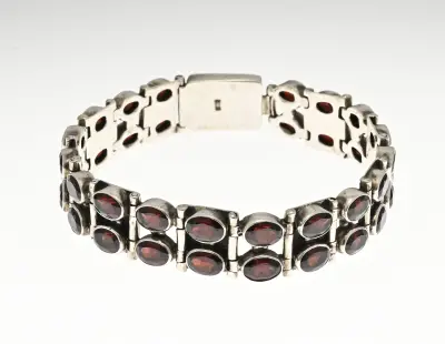 Zilveren armband modern granaat – kavel bij Twents Veilinghuis