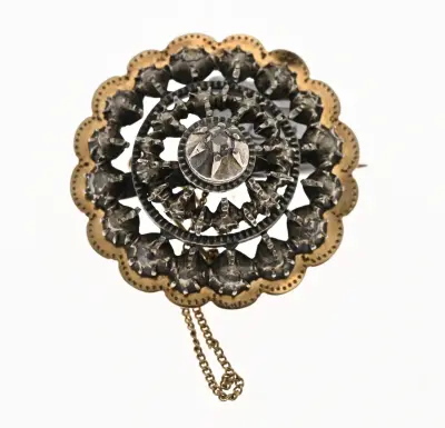 Gouden broche met diamant – kavel bij Twents Veilinghuis