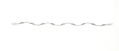 Witgouden armband met diamant en smaragd – kavel bij Twents Veilinghuis
