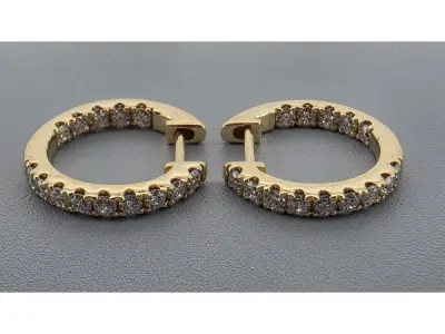 Gouden oorbellen ingelegd met diamant – kavel bij XL Auctions