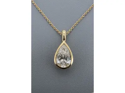 Elegante gouden druppelhanger met diamant – kavel bij XL Auctions